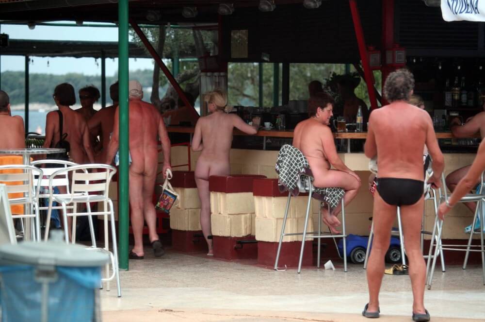 Outdoor diner view - Nudism knows no boundaries