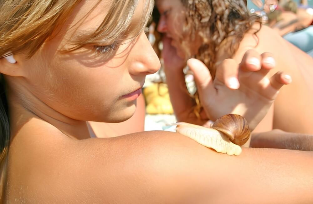 Premium photo series # 5 - People seek unity with nature through naturist practices