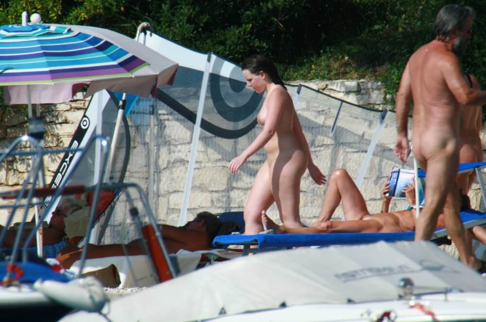 Girl Daytime Bath - Nudists relax beautifully—a sight to behold