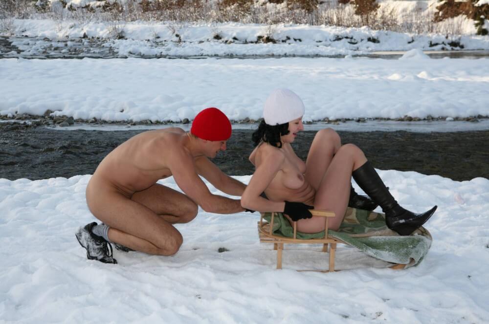 Naturist Girl Snow Day Couples Sled pics - Blending in with the crowd of nudists