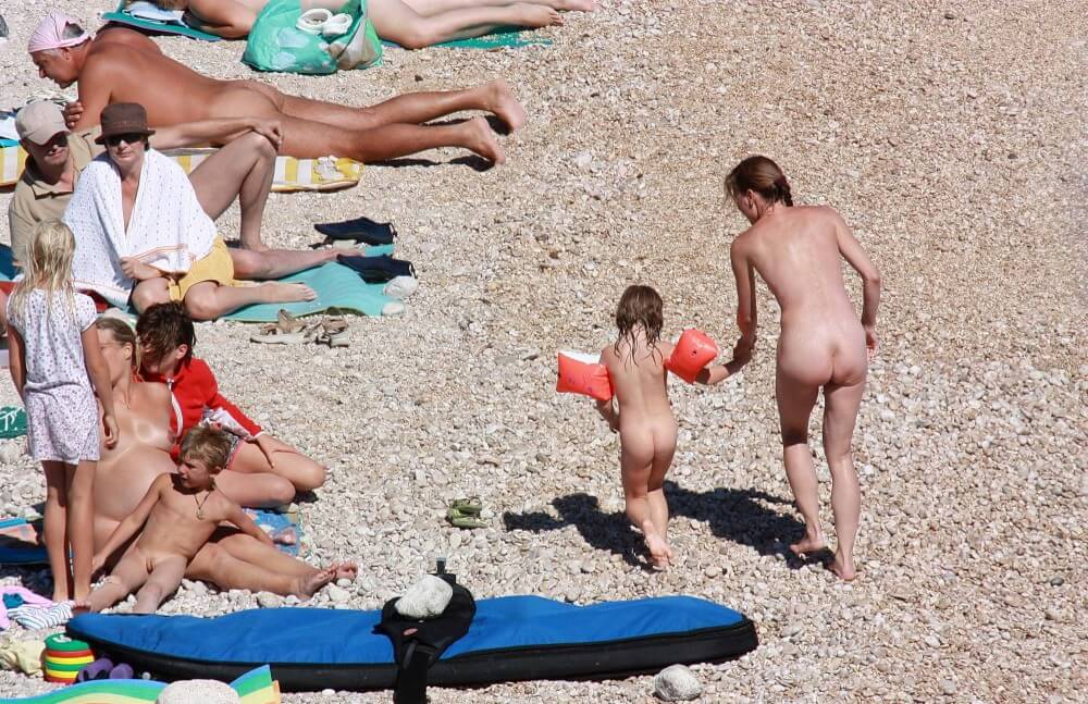 Orange Floaty Safety First Naturist pics - Watching us naked in nature